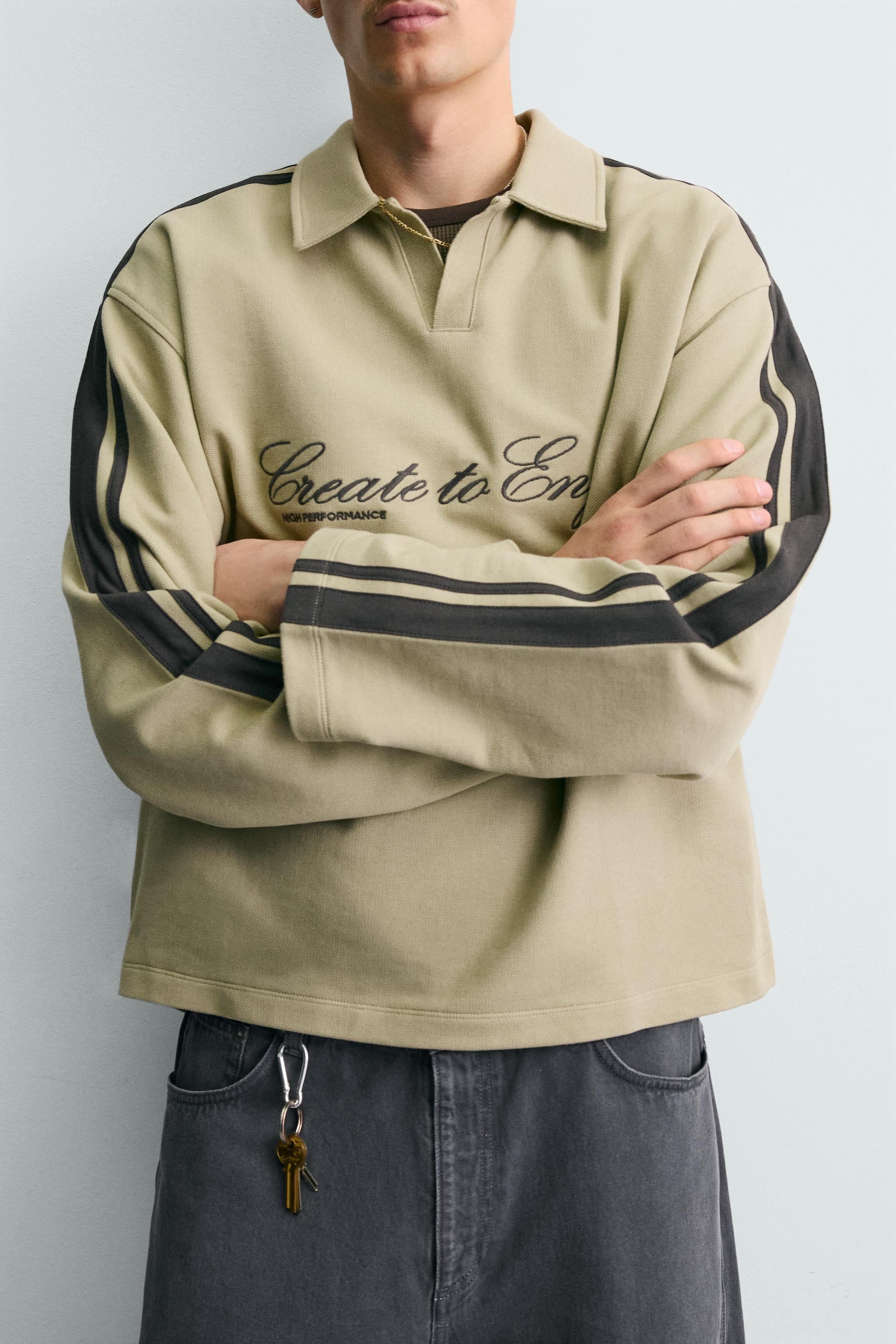 BOXY FIT EMBROIDERED STRIPED SWEATSHIRT